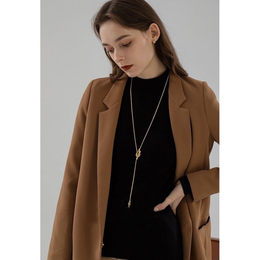 Elegante lange trui ketting