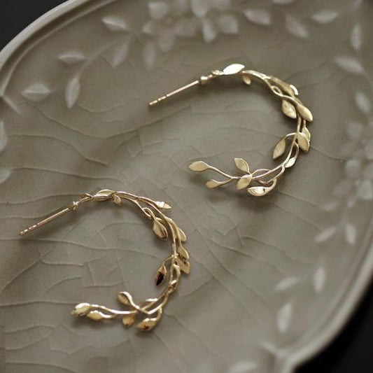 Lauwerkrans oorbellen in goud of zilver