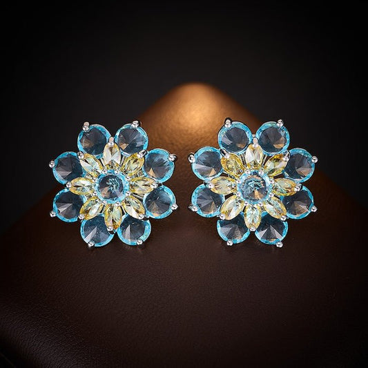 Blikvanger: Blue Daisy Flower oorbellen
